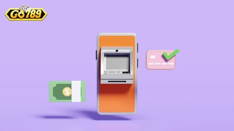 Điện thoại hình cây ATM cùng tiền mặt và thẻ ngân hàng minh họa phương thức rút tiền GO789